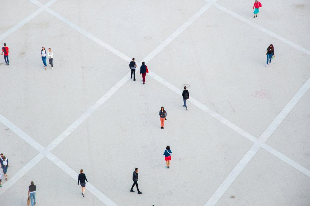 people-walking-on-spacious-concrete-square-5191376